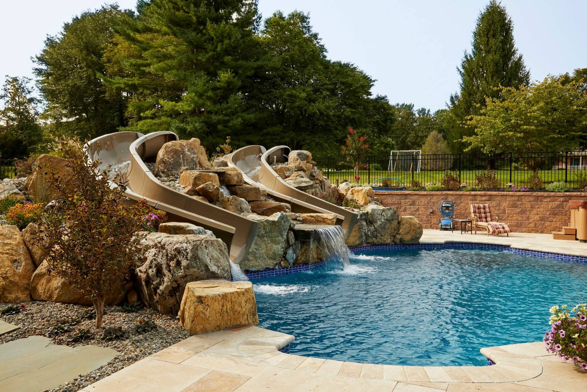 Compact modern swimming pool designed for a smaller residential backyard