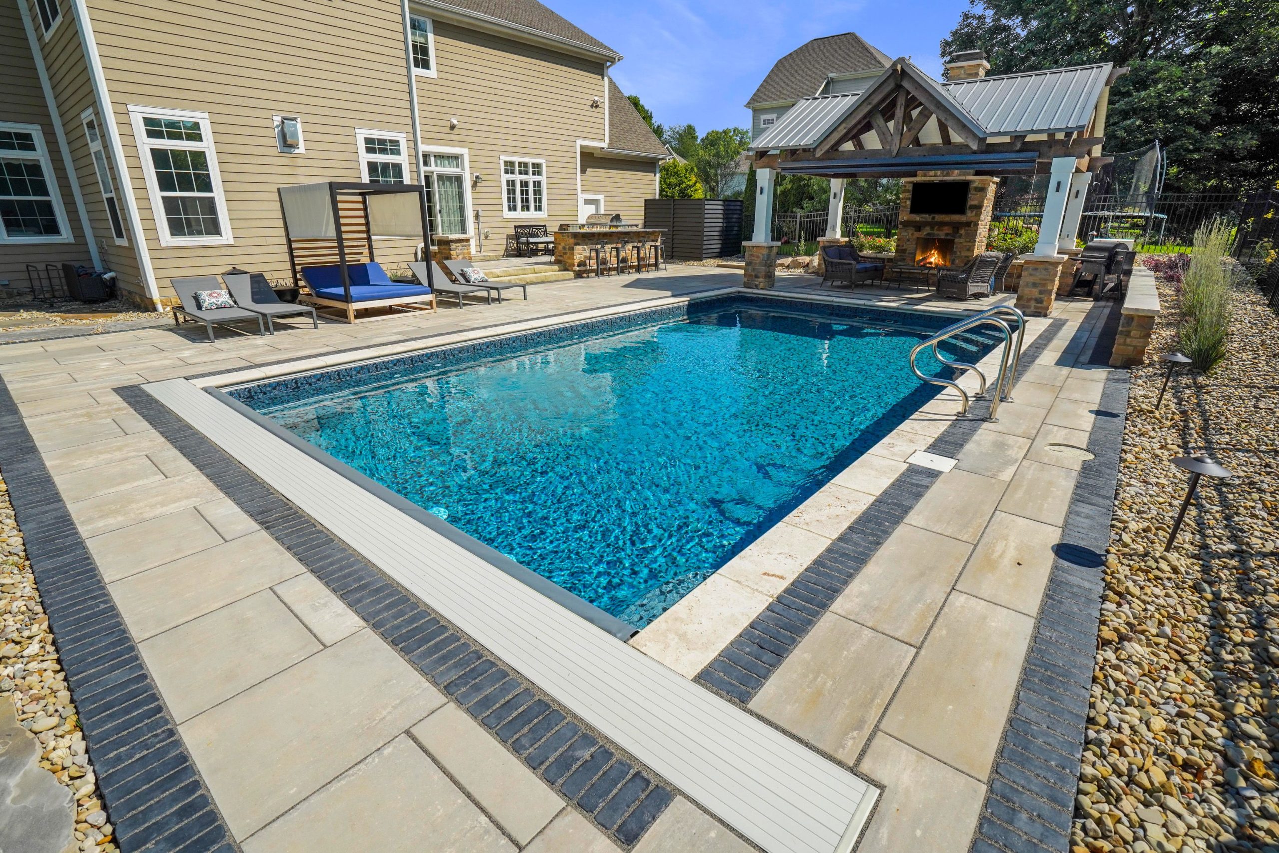 Swimming pool planning materials showing layout sketches, surface samples, and installation details